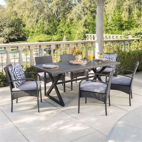 ashley outdoor  piece grey aluminum dining set  grey wicker dining chairs  grey water
