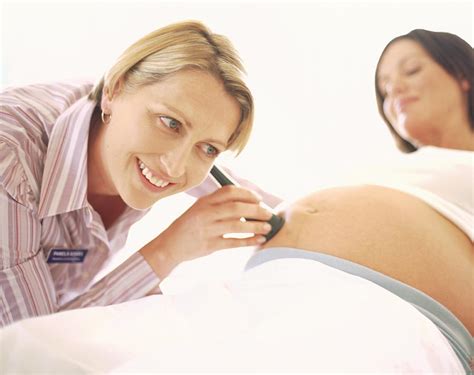 obstetric examination photograph by ian hooton science photo library