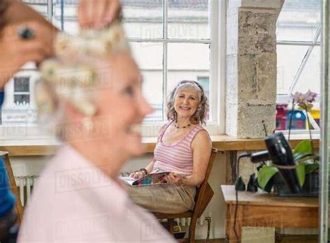 senior women  hairdressers stock photo dissolve