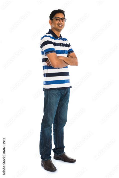 cheerful casual indian man full body isolated  white stock photo