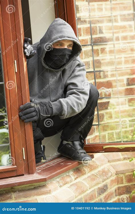 young man breaking  house stock photography image