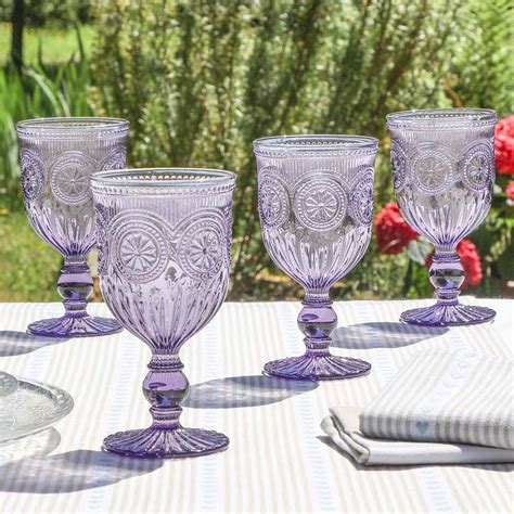 set of four purple embossed wine glasses by dibor