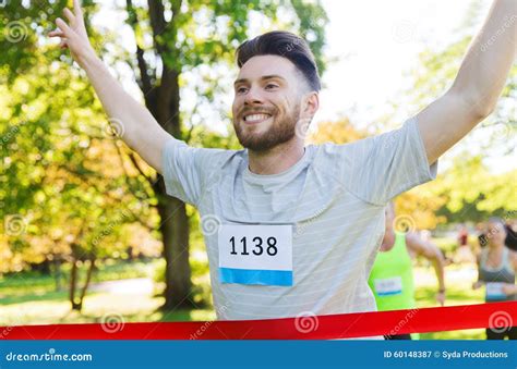 happy young male runner winning  race finish stock image image  friends nature