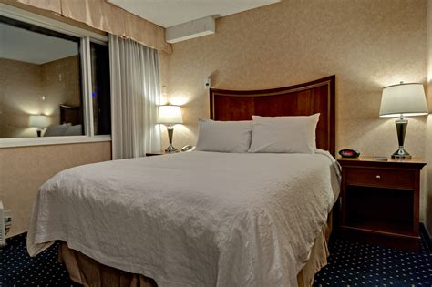 western suites calgary  bedroom queen suite