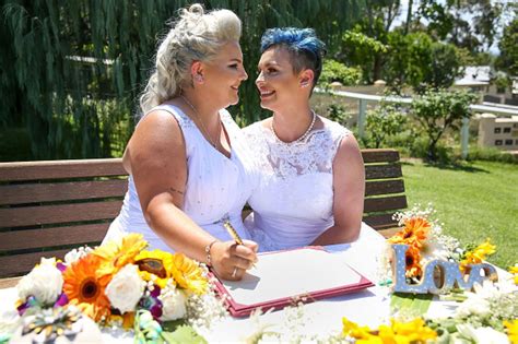 brides become australia s first same sex married couple