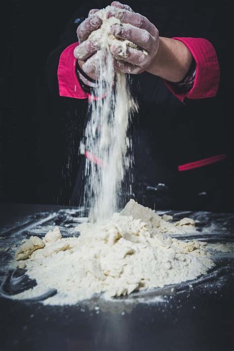 flour person mixing dough human image  photo
