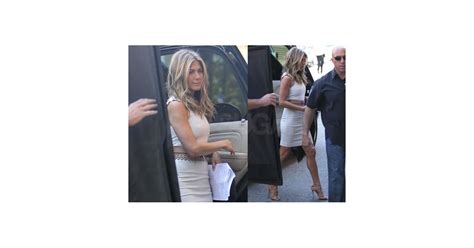photos of of jennifer aniston in a hot white dress on set