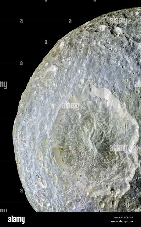 herschel crater  mimas stock photo alamy