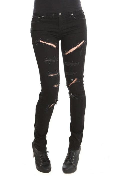 i want this so bad from hot topic black ripped skinny jeans with safety pins i want