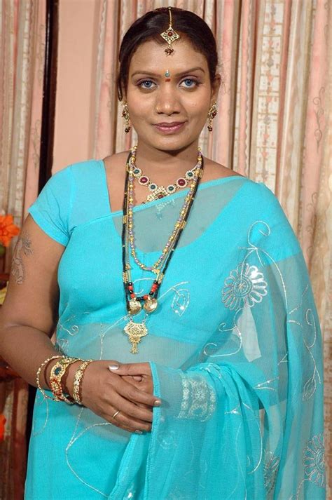 south india character artist mallika latest beautiful blue saree photoshoot beautiful indian