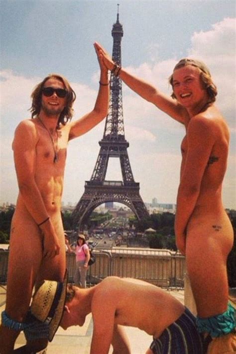 tourists try out flash photography with cheeky nude snaps all over the world