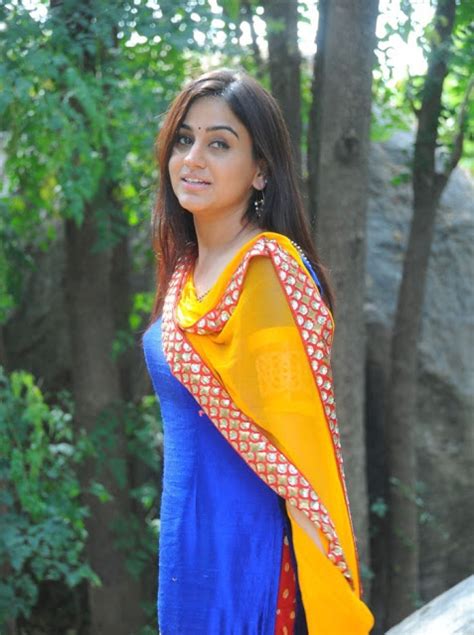 bollywood actress saree collections aksha pardasany in blue churidar yellow dupatta