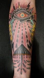 colorful red eye tattoo  arm tattoomagz tattoo designs ink