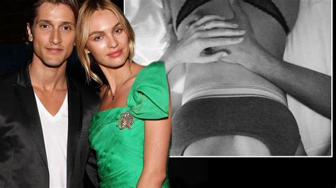 candice swanepoel confirms pregnancy as she and fiancé cradle her bare