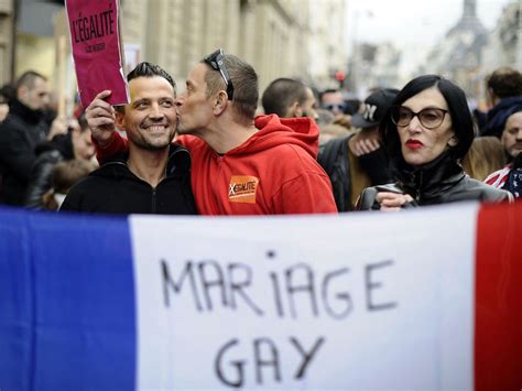 french president francois hollande signs gay marriage and same sex