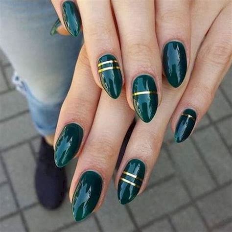 green manicures add  flair  gold striping tape emerald