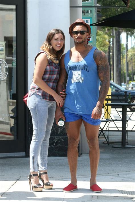 check them out kelly brook and her mr muscle david mcintosh put on a serious show of pda