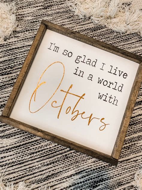 im so glad i live in a world where there are octobers sign etsy
