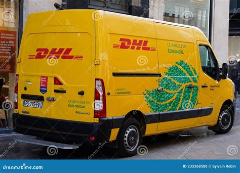 dhl logo brand  sign text  yellow delivery panel van car courier truck editorial stock