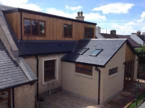 large flat roof dormer  cedar clad finish andrew allan architecture