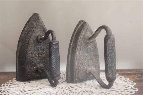 pair  antique cast iron sad irons  myvintagelane  etsy