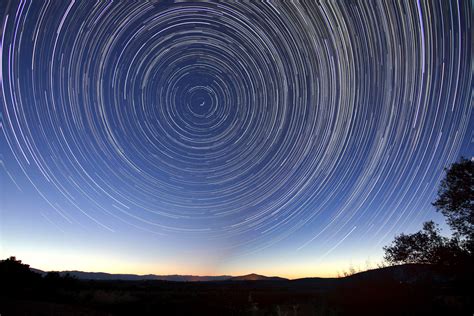 star trails   sky   landscape image  stock photo