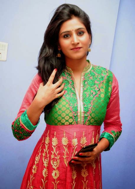 tv actress varshini sounderajan latest pics in red dress navel queens