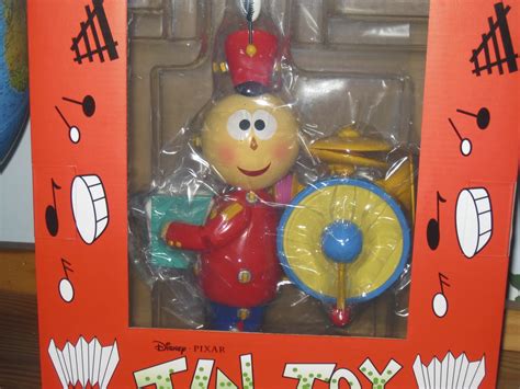 dan the pixar fan tin toy tinny replica