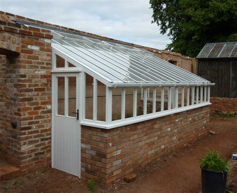 white painted finish woodpecker joinery lean  greenhouse greenhouse victorian greenhouses