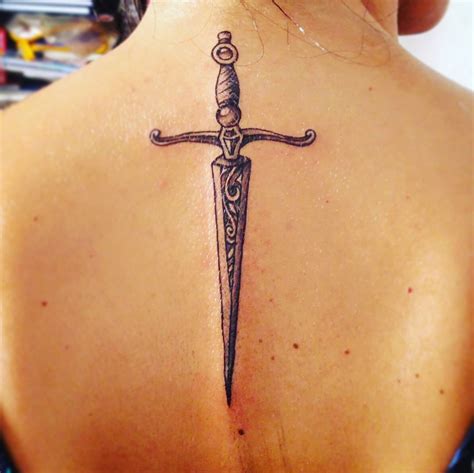 flaunt  sense  sophistication   sword tattoo ideas