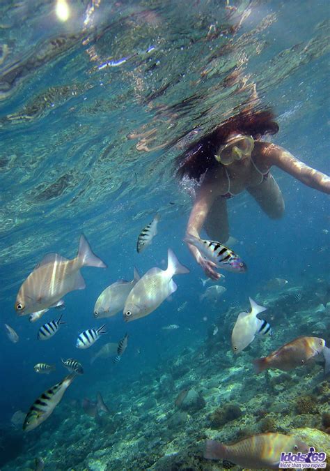asian nude girl swimming underwater