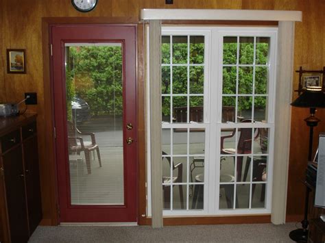 Steel Entry Doors With Blinds Between The Glass Panes