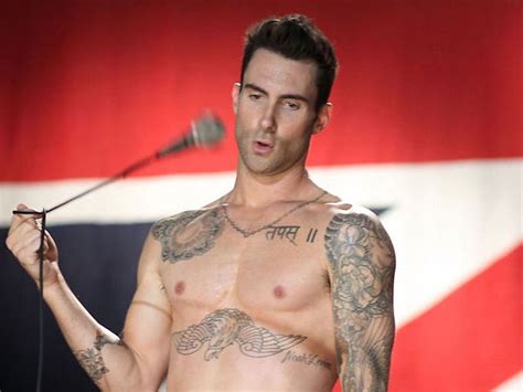 photos 8 ways adam levine vanquished all others to become the sexiest man alive queerty