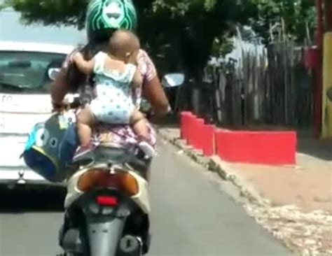 vídeo mostra mulher pilotando moto com bebê supostamente preso a um canguru em natal rn