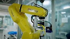 Installing Fanuc robot cells for Electronics Assembly. Box build electronics manufacturing