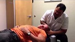 Chiropractor Dr. Matt Rivera adjusting Swedish bodybuilder