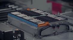 BMW Production of battery modules - Thermal paste is applied
