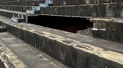 Sinkhole unearths rumored moonshine cave under North Wilkesboro Speedway grandstands