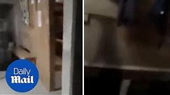 Terrifying moment night security guard films ghostly shadow - Daily Mail