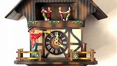 Horn Player musical cuckoo clock. Made in West Germany, 1980. Horn player and dancers move!