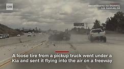 Dashcam video shows car flip mid-air on freeway after hitting a loose tire