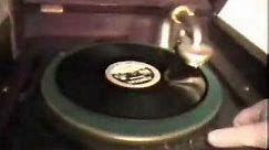 Edison C-200 "Adam" phonograph playing record