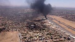 Smoke rises in Khartoum, Sudan as paramilitary group battles army