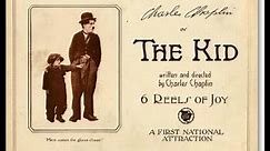 Charlie Chaplin & Jackie Coogan in "The Kid" (1921)