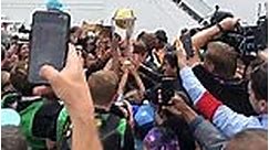 Children touch Cricket World Cup trophy as players return to Lord's