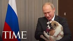 Here's The Awkward Moment When Vladimir Putin Got A Puppy As A Gift | TIME