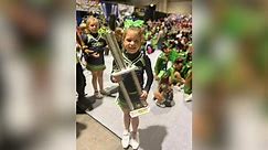 8-year-old becomes an instant hero after bravely going solo at a cheerleading team event