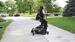 Quadriplegic using a Permobil Standing Wheelchair