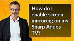 How do I enable screen mirroring on my Sharp Aquos TV?