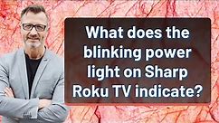 What does the blinking power light on Sharp Roku TV indicate?